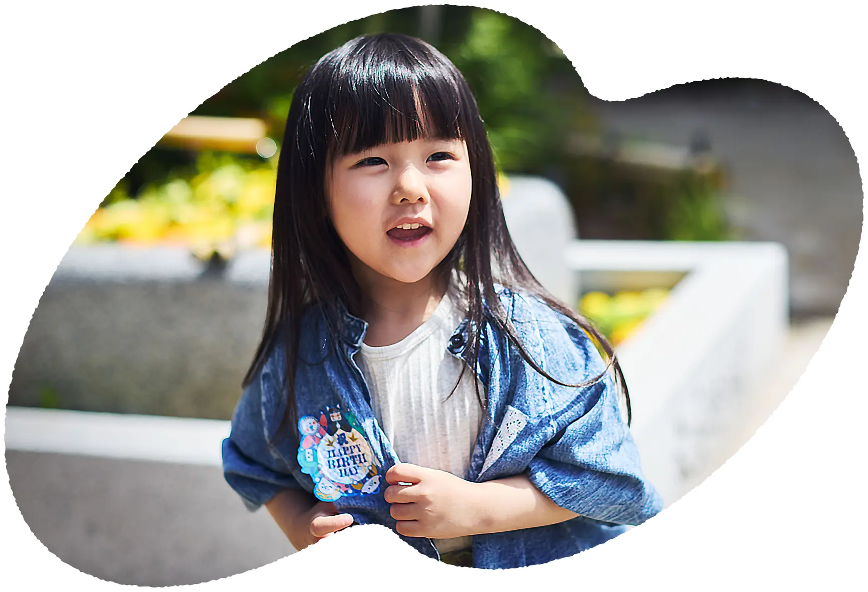 Photo of a child receiving a birthday sticker